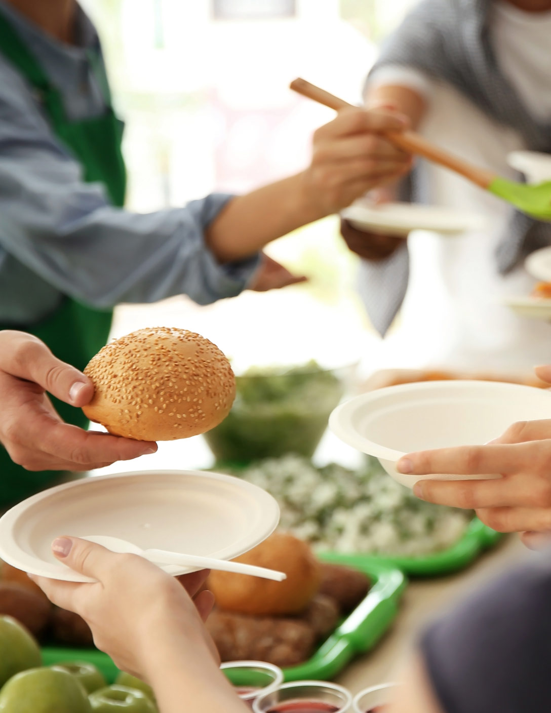 Persons serving meals.