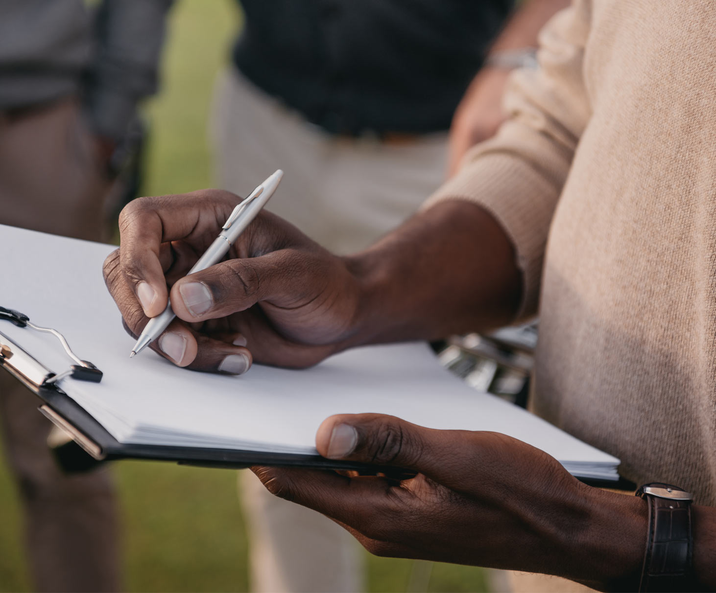 A person taking notes.