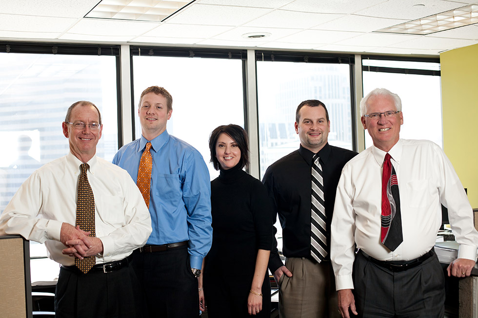 2010 architects and interior designers in office with windows in background