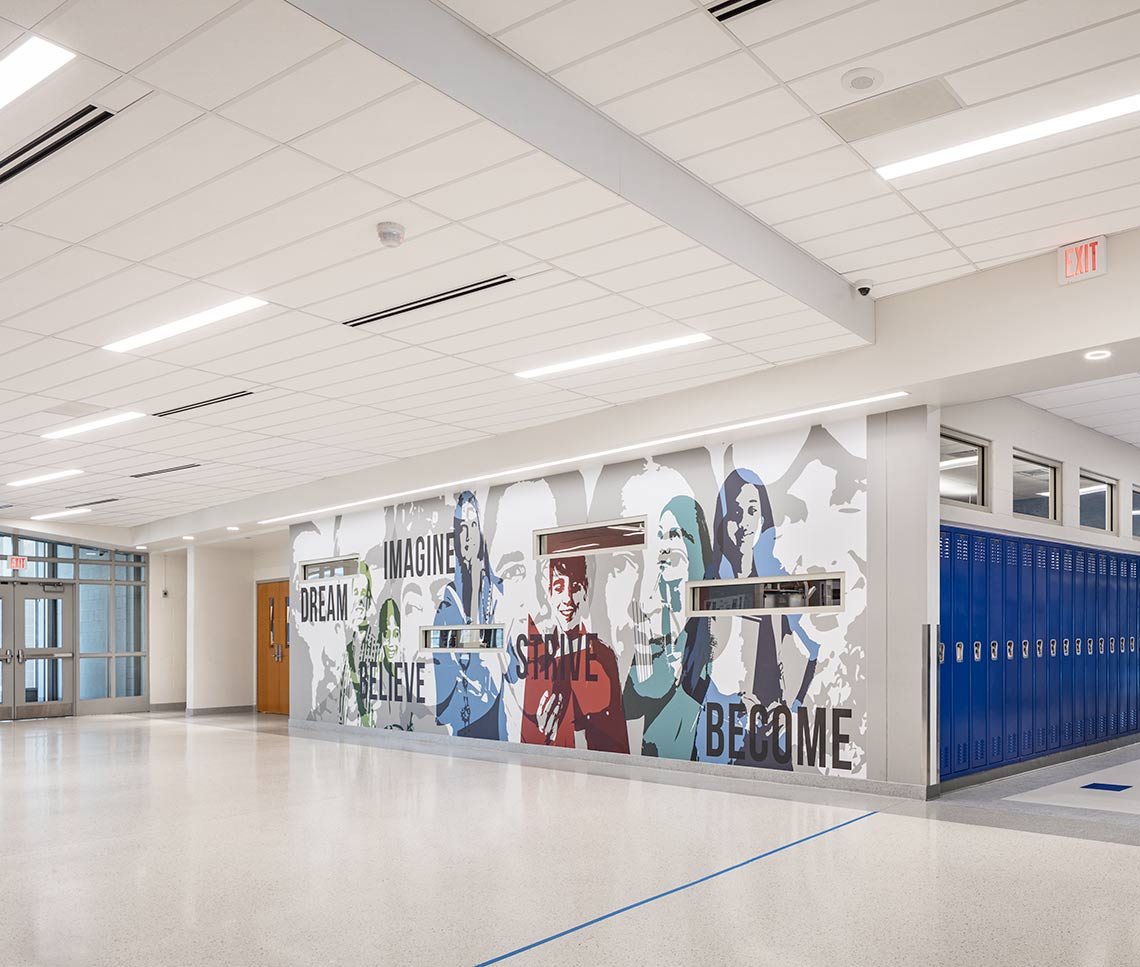 Middle school entry corridor with inspirational signage