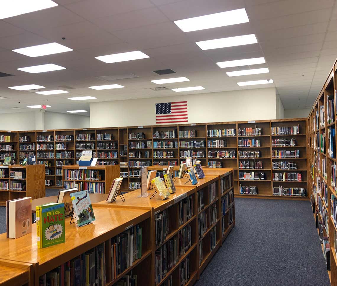 Old school library with bookshelves