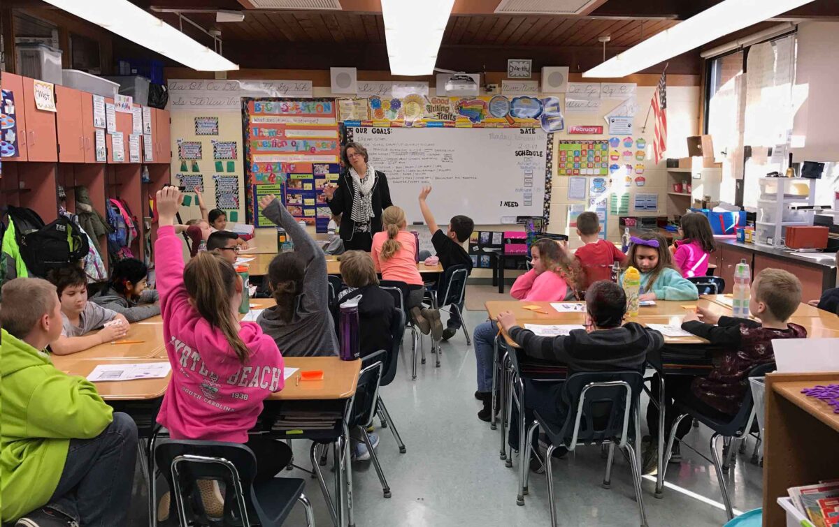 Architect talks to a classroom full of elementary school students